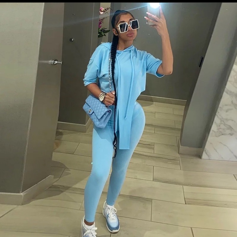 Irregular top , blue two piece set .